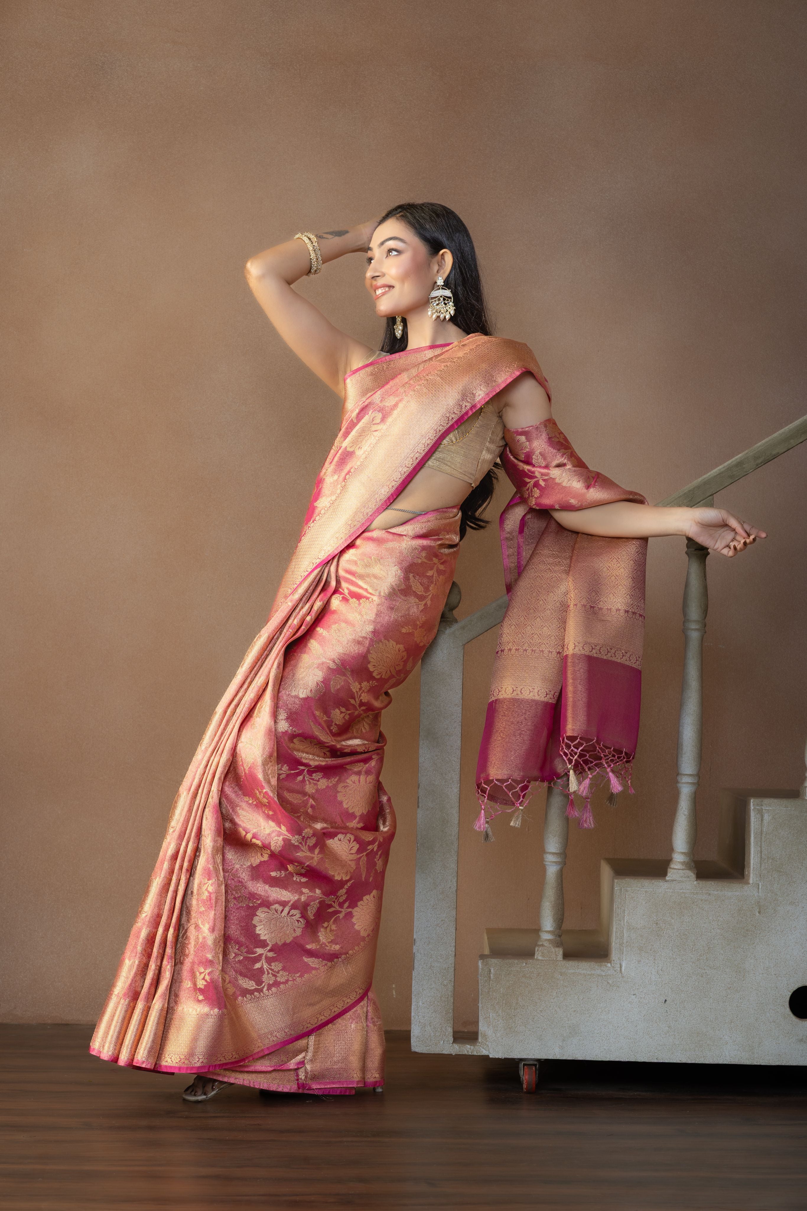 Rusted Pink Tissue Silk Jaal Weave Banarasi Saree | Rusted pink tissue silk Banarasi saree with intricate jaal weaving and lightweight drape