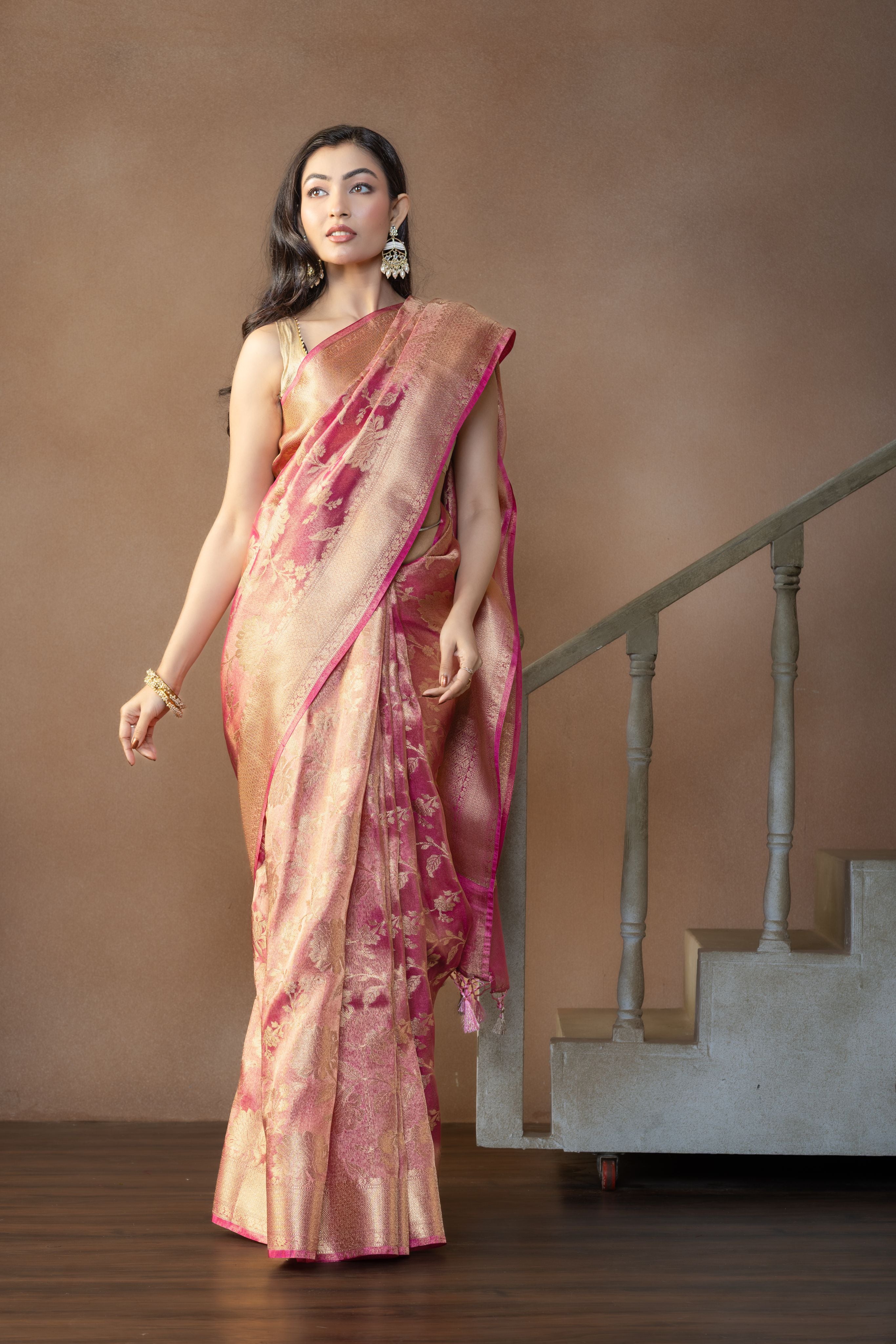 Rusted Pink Tissue Silk Jaal Weave Banarasi Saree | Rusted pink tissue silk Banarasi saree with intricate jaal weaving and lightweight drape