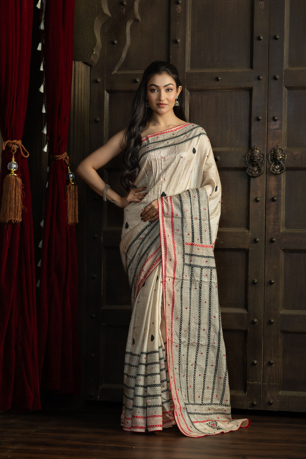 Gachi Tussar with multi colour Katha stitch and mirror work in beige base colour designer saree.