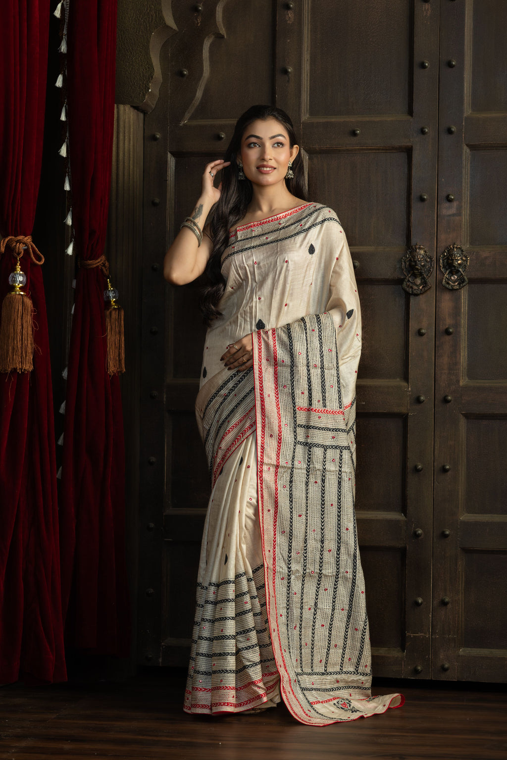 Gachi Tussar with multi colour Katha stitch and mirror work in beige base colour designer saree.
