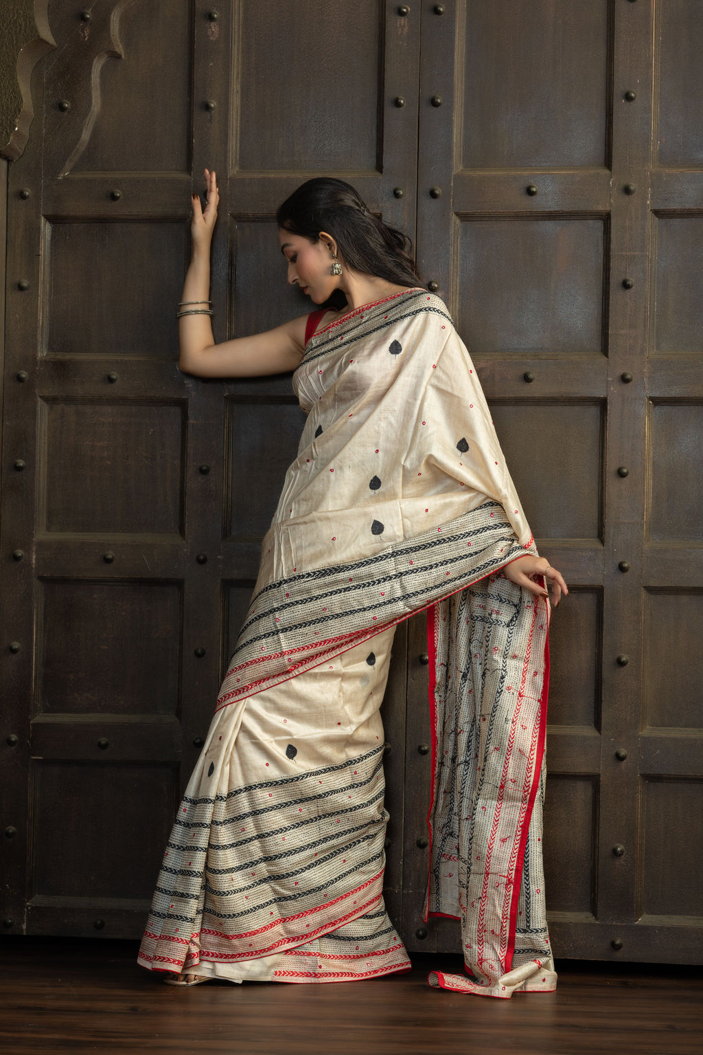 Gachi Tussar with multi colour Katha stitch and mirror work in beige base colour designer saree.