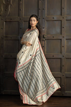 Gachi Tussar with multi colour Katha stitch and mirror work in beige base colour designer saree.
