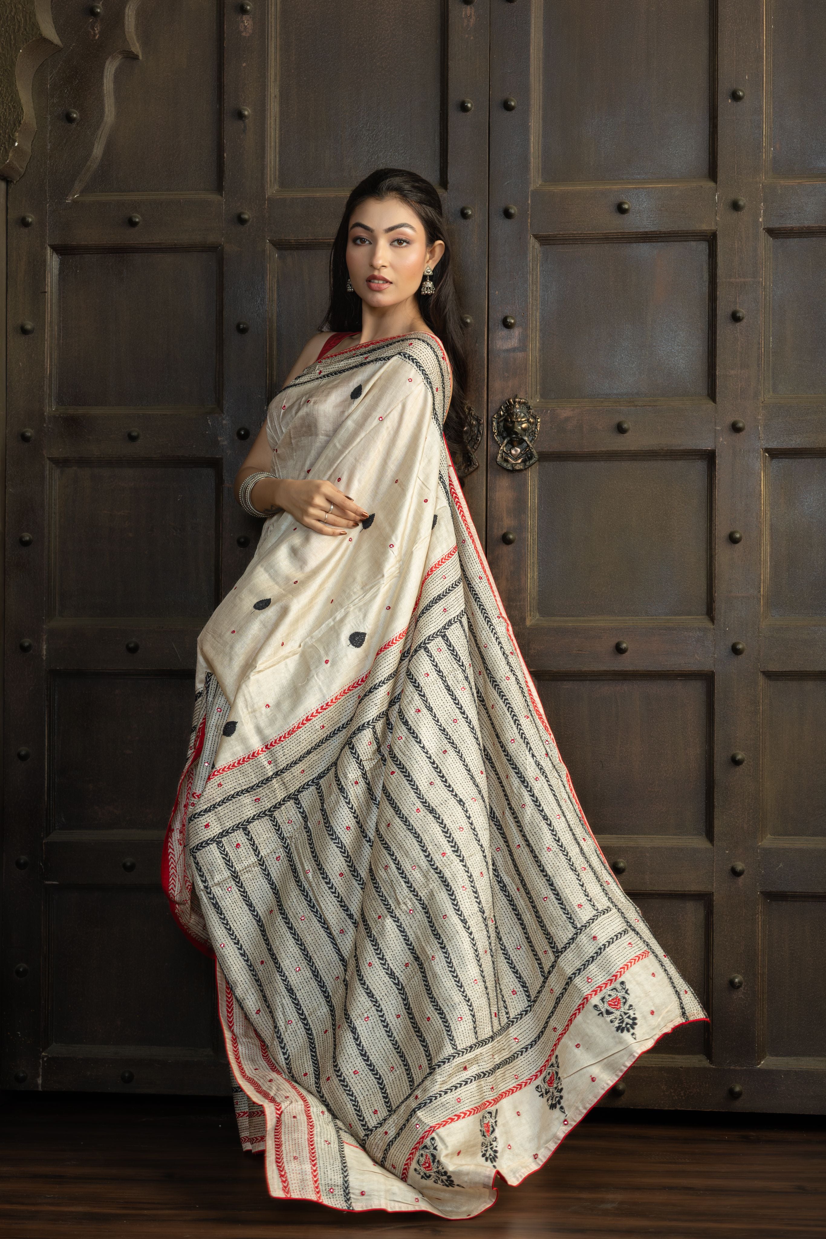 Gachi Tussar with multi colour Katha stitch and mirror work in beige base colour designer saree.