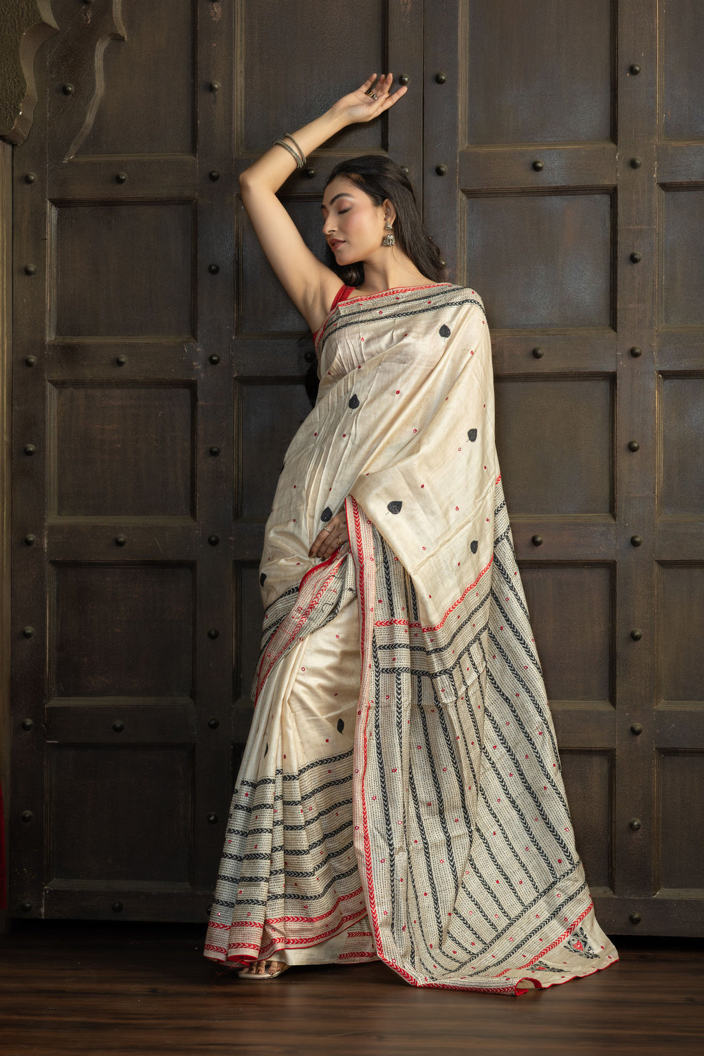 Gachi Tussar with multi colour Katha stitch and mirror work in beige base colour designer saree.