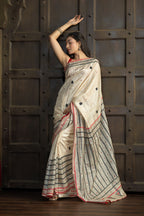 Gachi Tussar with multi colour Katha stitch and mirror work in beige base colour designer saree.