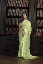 Mint Green Viscose Georgette Banarasi Saree | Mint green viscose georgette Banarasi saree with graceful buta patterns and airy feel.