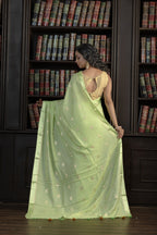 Mint Green Viscose Georgette Banarasi Saree | Mint green viscose georgette Banarasi saree with graceful buta patterns and airy feel.