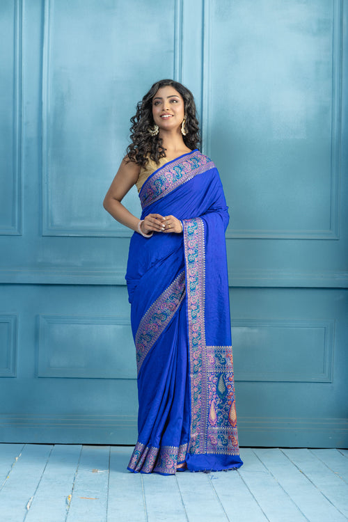 Blue Banarasi Georgette Silk Zari Border Saree | Blue Banarasi georgette silk saree featuring golden zari border and soft drape.