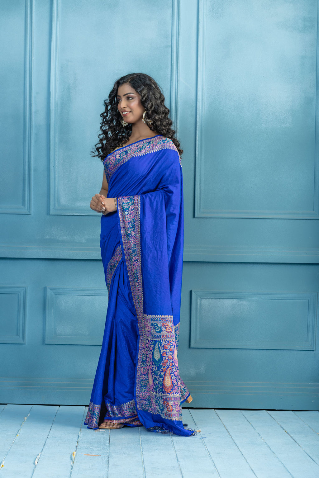 Blue Banarasi Georgette Silk Zari Border Saree | Blue Banarasi georgette silk saree featuring golden zari border and soft drape.
