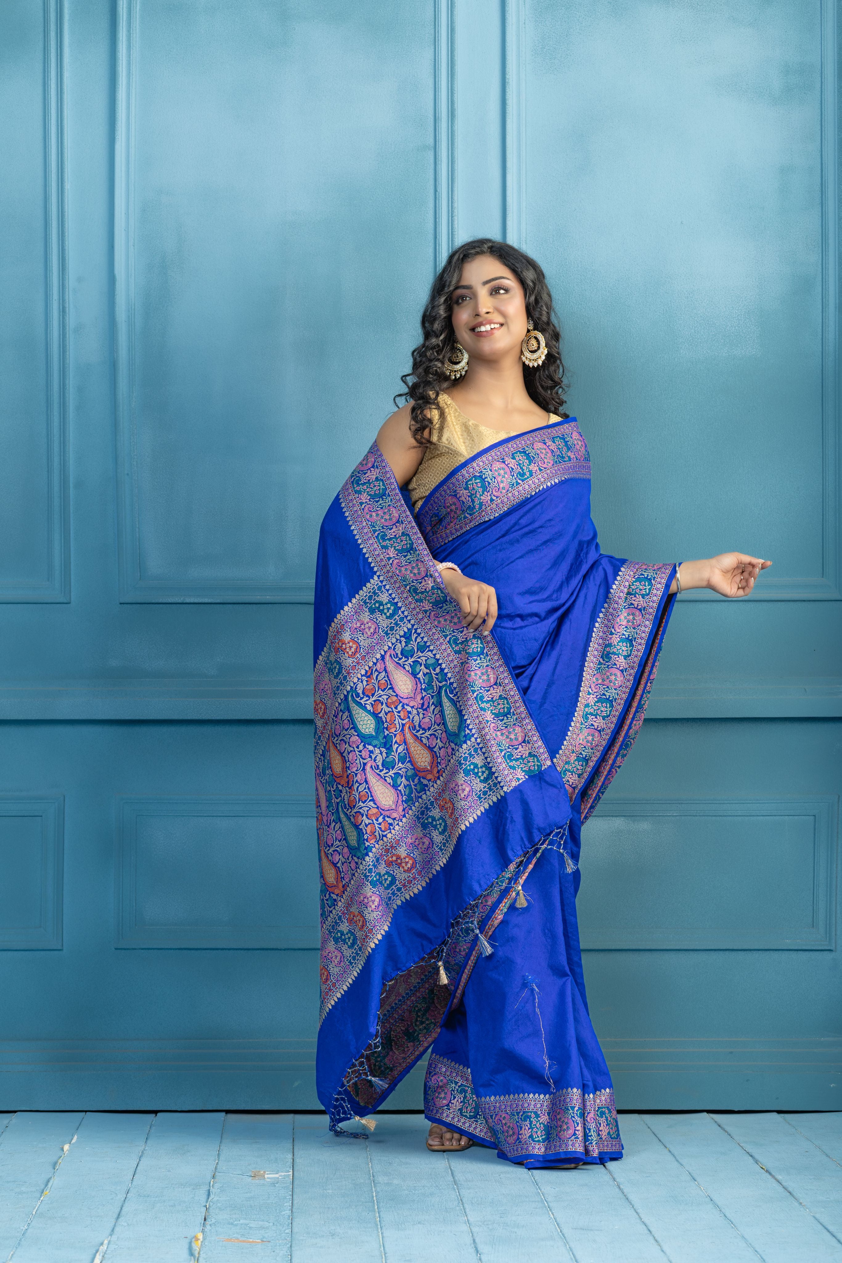 Blue Banarasi Georgette Silk Zari Border Saree | Blue Banarasi georgette silk saree featuring golden zari border and soft drape.