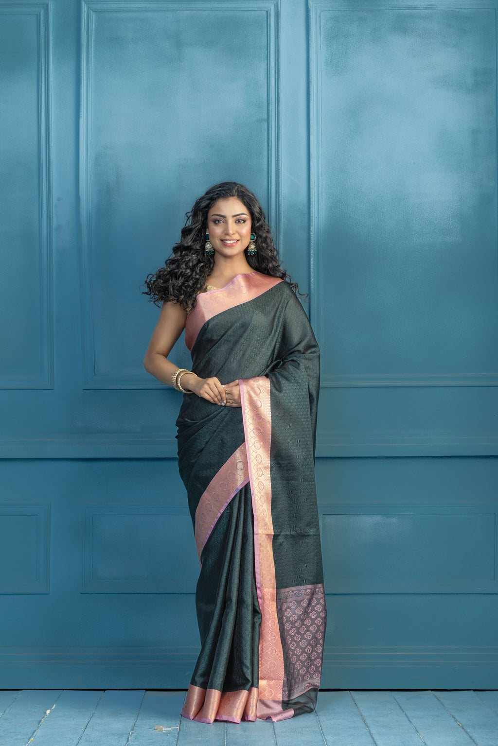 Bottle Green Kanchi Kora Embossed Weave Saree | Elegant bottle green Kanchi kora silk saree with textured embossed weave