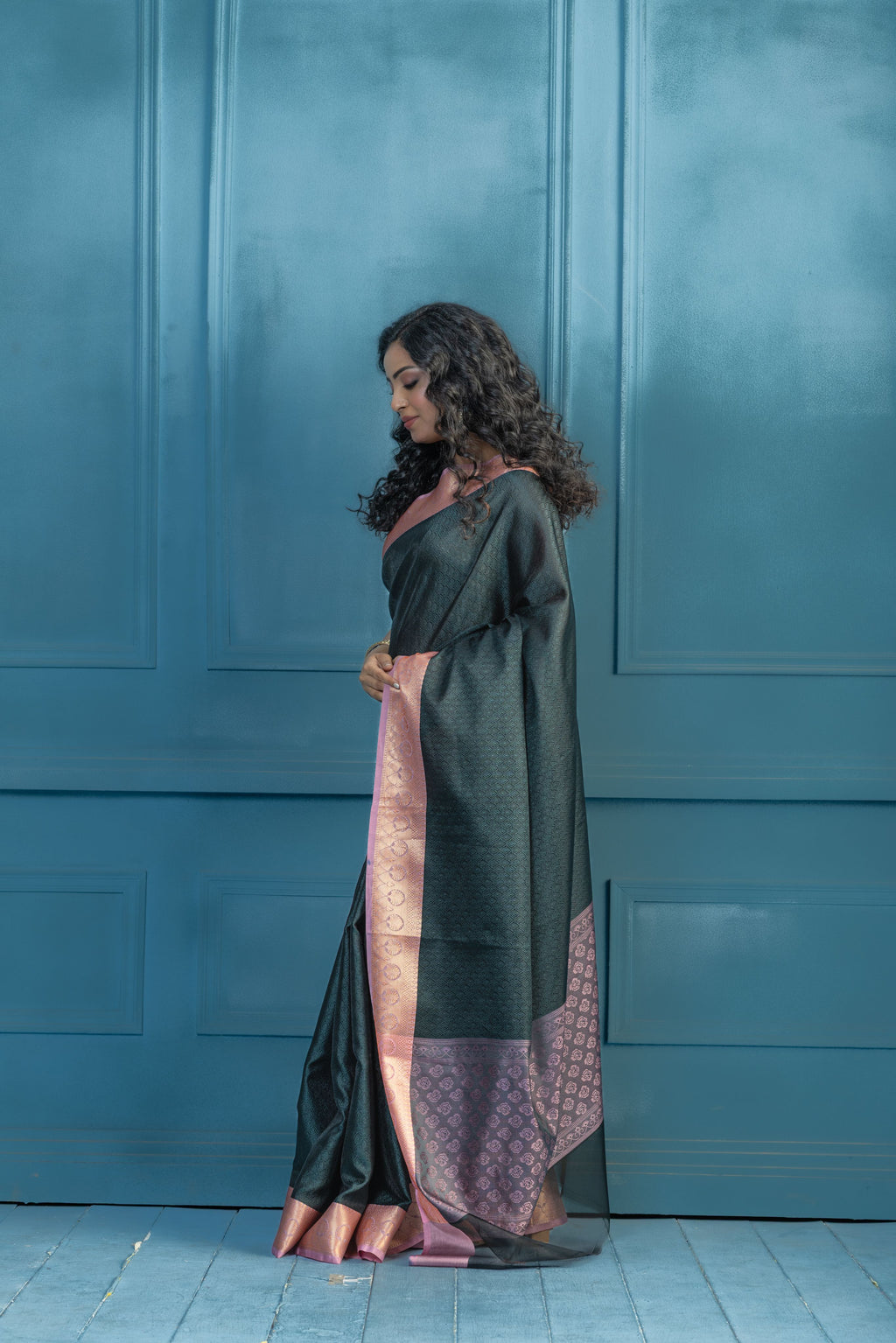 Bottle Green Kanchi Kora Embossed Weave Saree | Elegant bottle green Kanchi kora silk saree with textured embossed weave