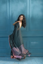 Bottle Green Kanchi Kora Embossed Weave Saree | Elegant bottle green Kanchi kora silk saree with textured embossed weave