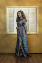 Hand-woven Bengal Tussar all over needle work Buta on black colour base. A elegant vibrant festive drape with timeless craftsmanship.