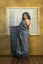 Hand-woven Bengal Tussar all over needle work Buta on black colour base. A elegant vibrant festive drape with timeless craftsmanship.