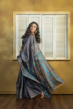 Hand-woven Bengal Tussar all over needle work Buta on black colour base. A elegant vibrant festive drape with timeless craftsmanship.