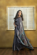 Hand-woven Bengal Tussar all over needle work Buta on black colour base. A elegant vibrant festive drape with timeless craftsmanship.