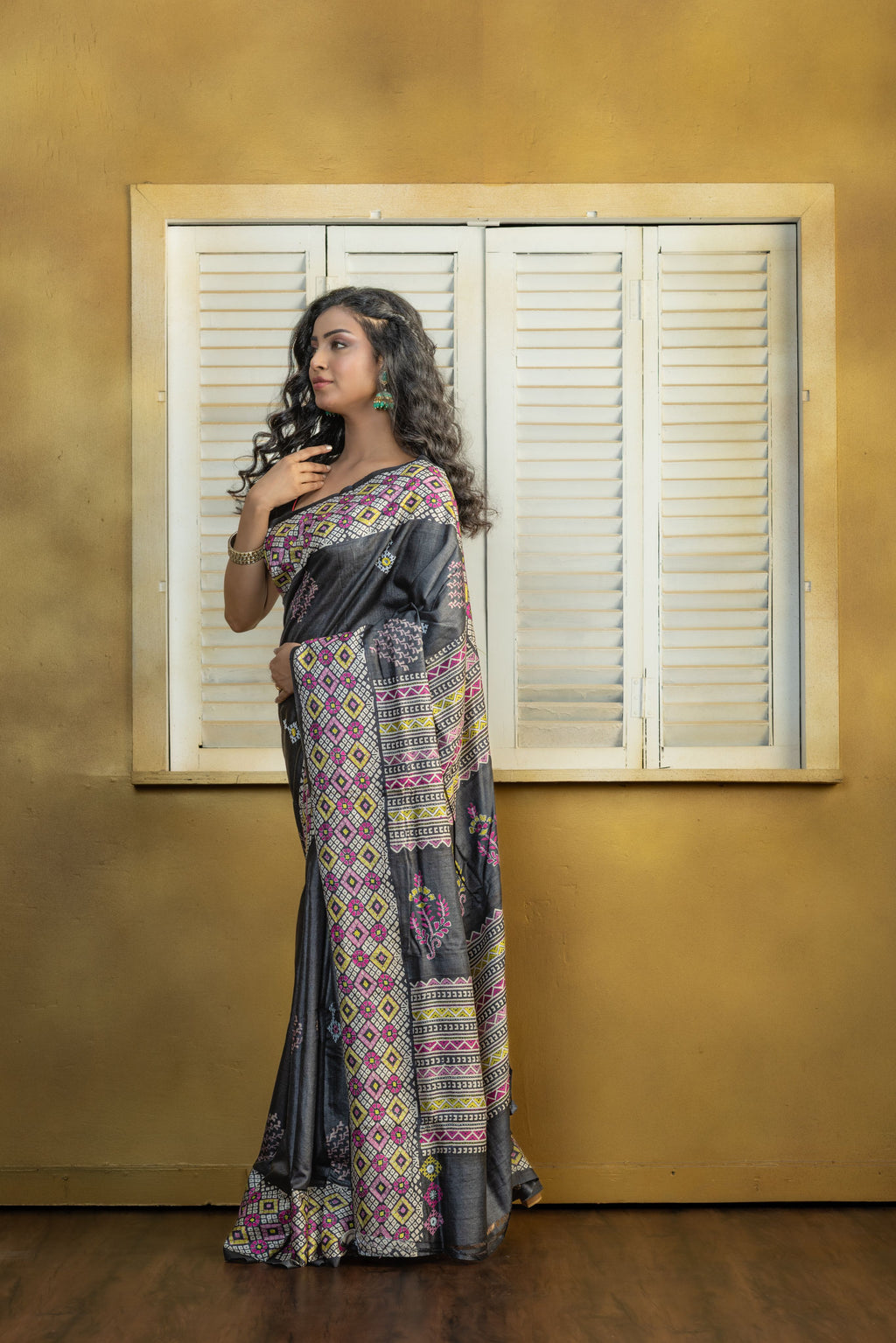 Exclusive Gachi by Gachi Tussar block print with Katha stitch and mirror work in black base colour designer saree.