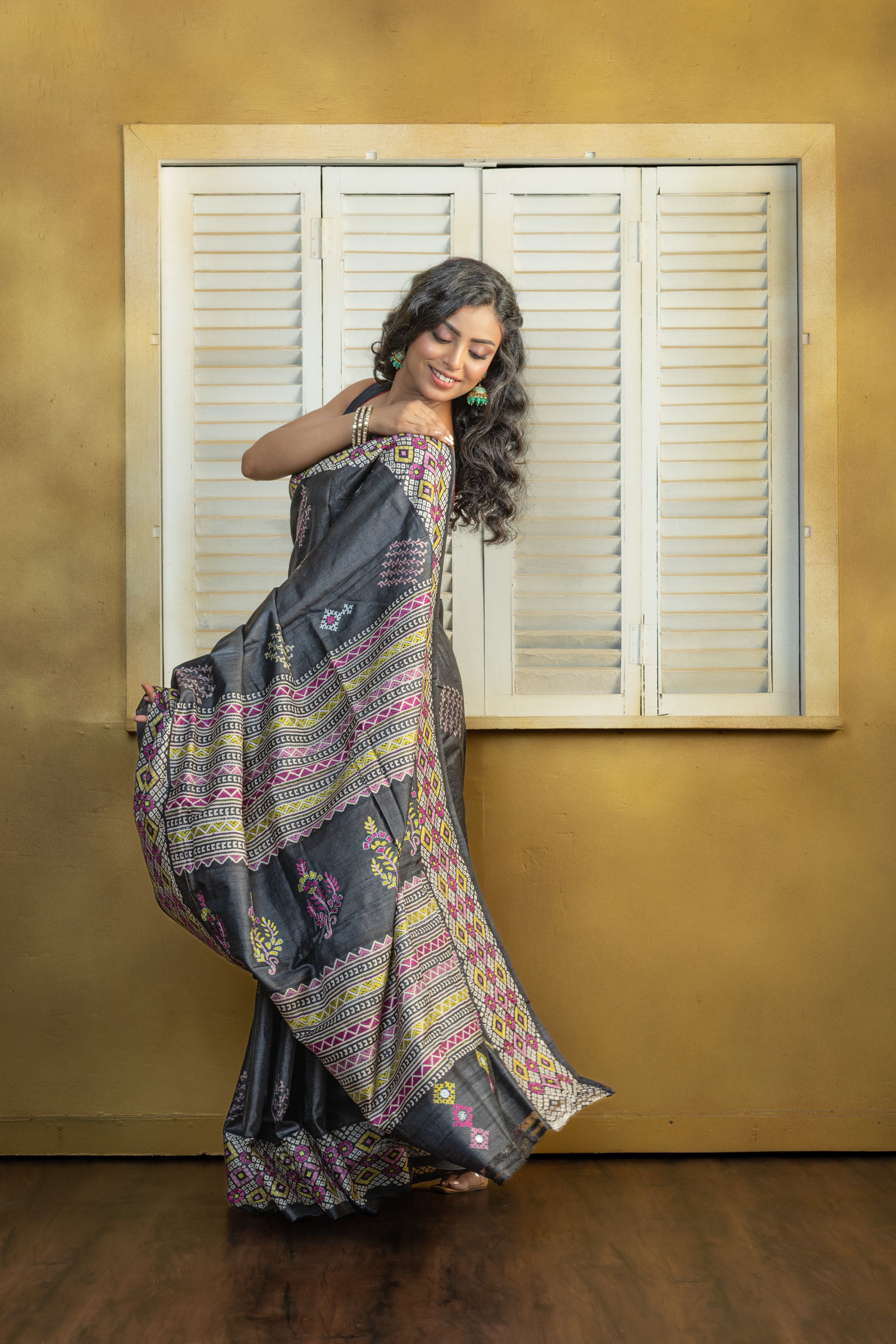 Exclusive Gachi by Gachi Tussar block print with Katha stitch and mirror work in black base colour designer saree.