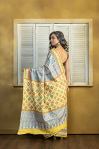 by Gachi Tussar block print with Gujarati mirror handwork work grey base colour designer saree