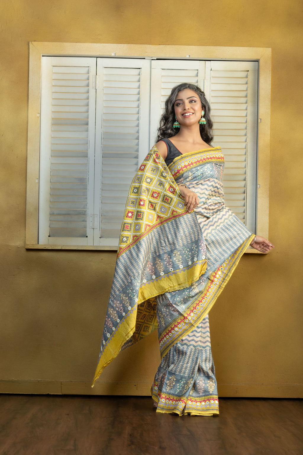 by Gachi Tussar block print with Gujarati mirror handwork work grey base colour designer saree