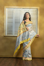 by Gachi Tussar block print with Gujarati mirror handwork work grey base colour designer saree