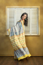 by Gachi Tussar block print with Gujarati mirror handwork work grey base colour designer saree