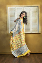 by Gachi Tussar block print with Gujarati mirror handwork work grey base colour designer saree