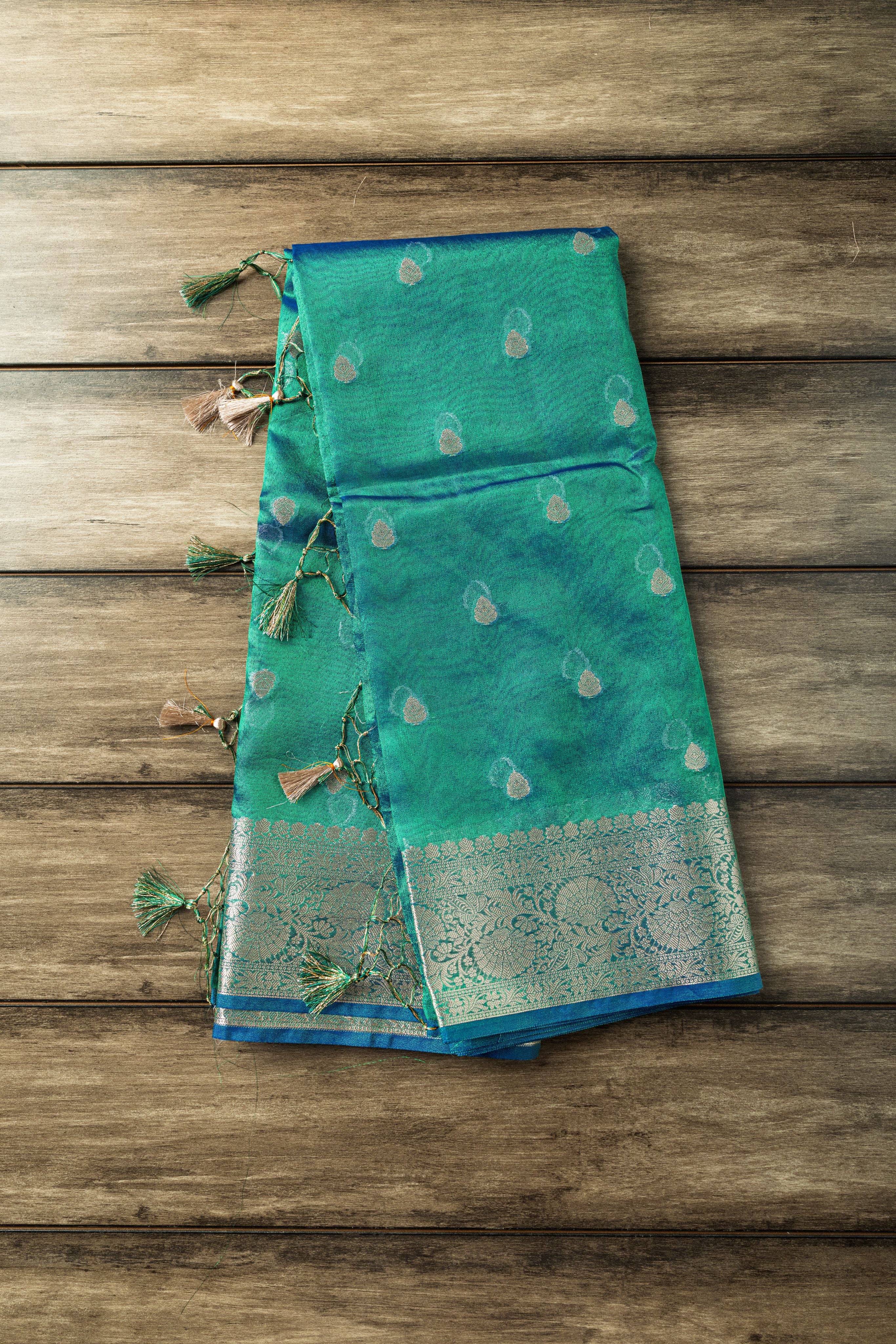 Peacock Soft Tissue Silk Khaddi Buti Banarasi Saree | Elegant peacock shade soft tissue silk Banarasi saree with intricate Khaddi buti work